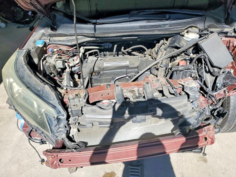 Photo 11 from auction – 2015 HONDA CR-V with VIN 2HKRM3H71FH510609