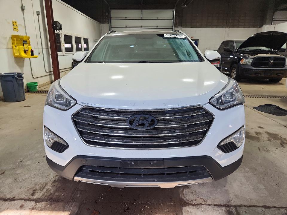 Снимка 5 от търг – 2015 HYUNDAI SANTA FE с VIN KM8SRDHF3FU120824