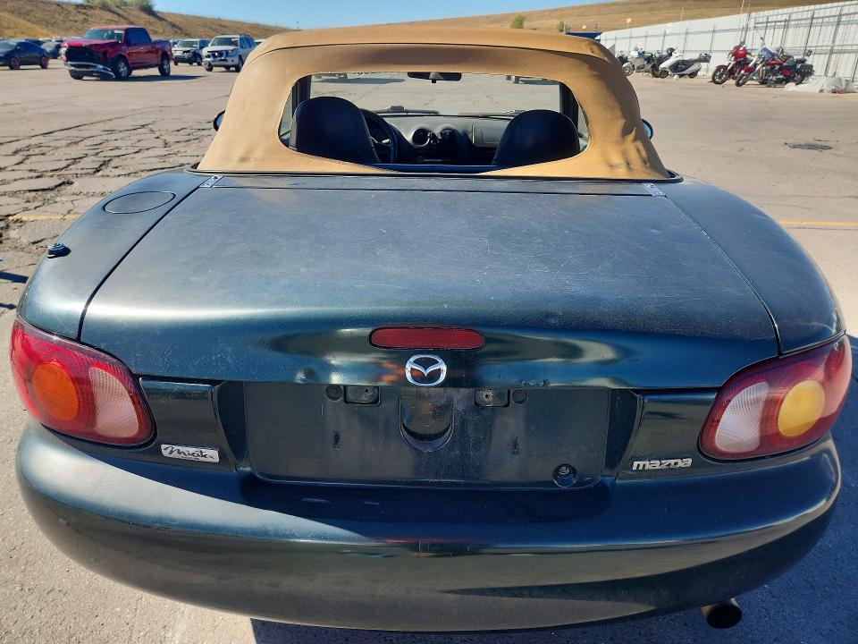 Снимка 6 от търг – 1999 MAZDA MX-5 MIATA с VIN JM1NB3539X0114125