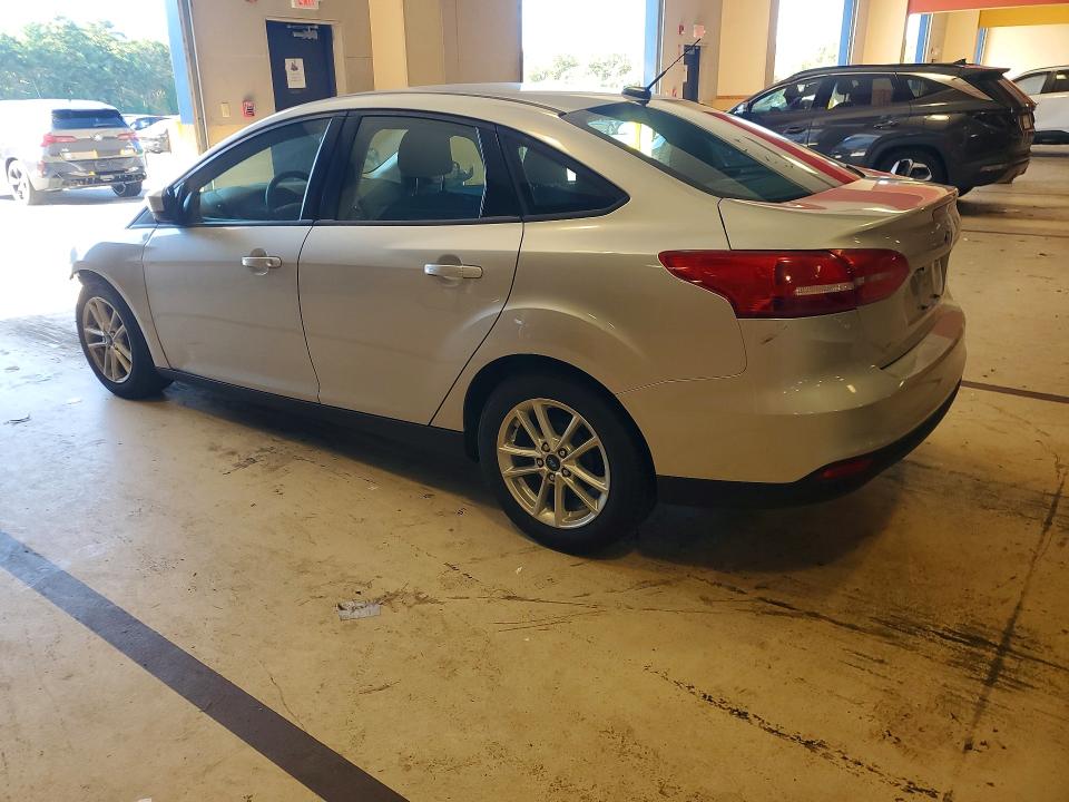 Photo 2 from auction – 2018 FORD FOCUS with VIN 1FADP3F24JL213899