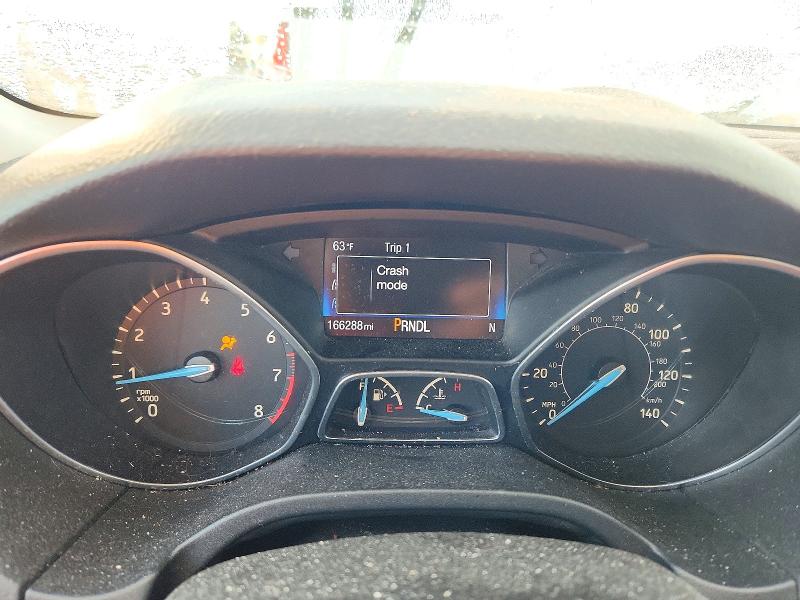 Снимка 9 от търг – 2015 FORD FOCUS с VIN 1FADP3F28FL203948