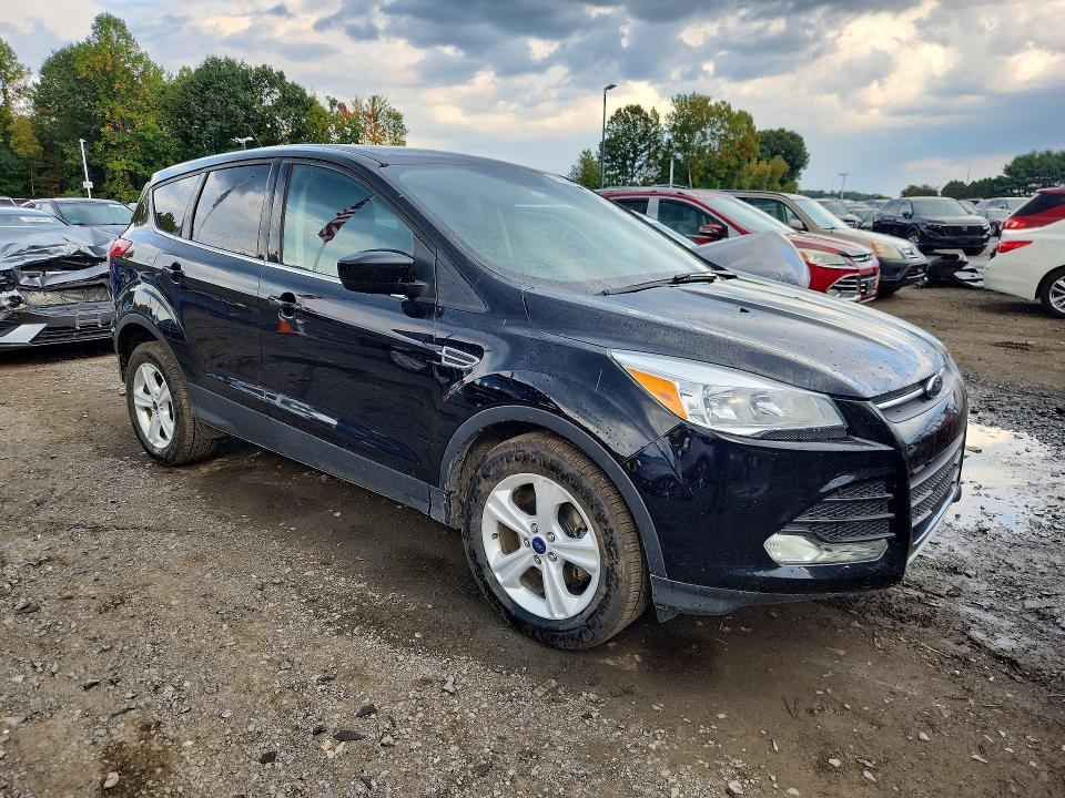Photo 4 from auction – 2016 FORD ESCAPE with VIN 1FMCU0GX2GUA59294