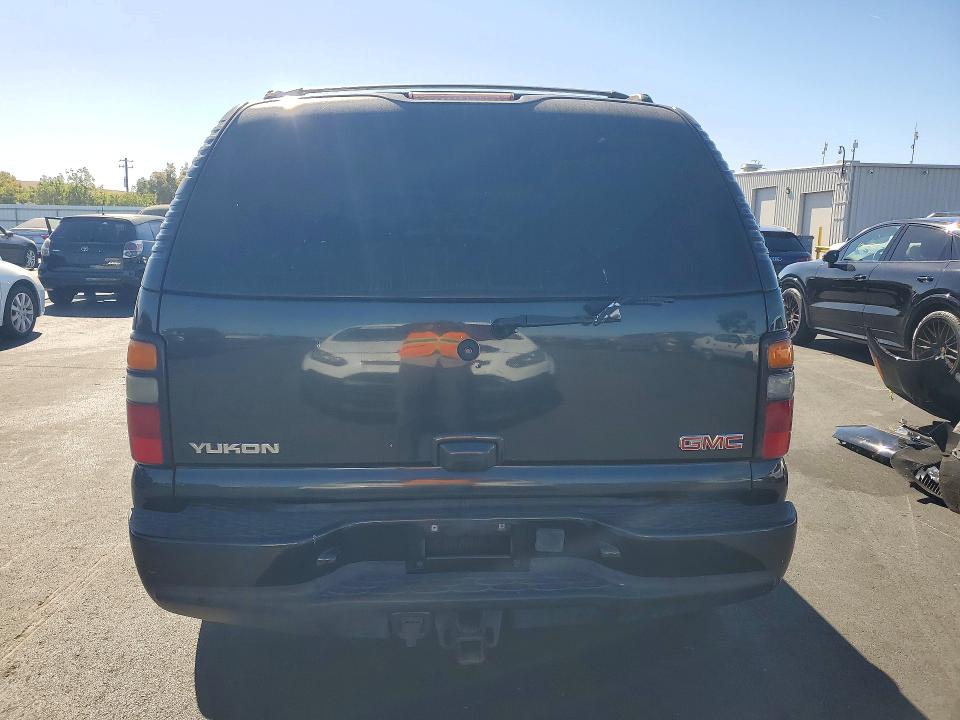 Снимка 6 от търг – 2004 GMC YUKON с VIN 1GKEK63U74J136129