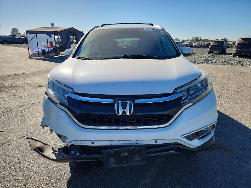 Photo 5 from auction – 2016 HONDA CR-V with VIN 5J6RM4H76GL039179