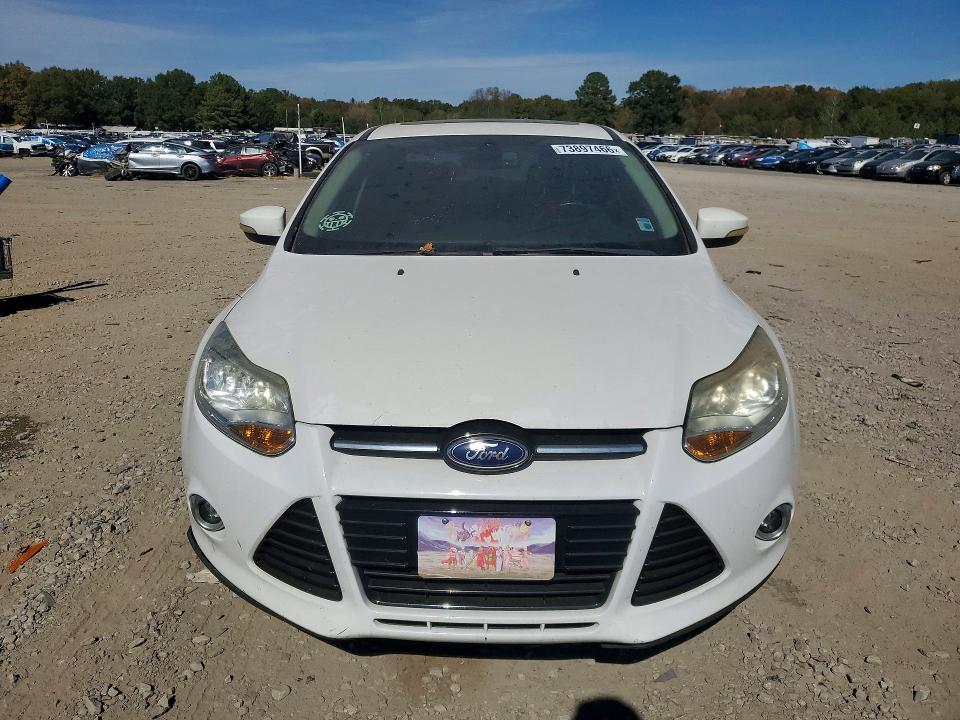 Foto 5 de la subasta – 2012 FORD FOCUS con VIN 1FAHP3H24CL386758