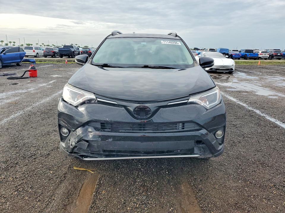Photo 5 from auction – 2016 TOYOTA RAV4 with VIN 2T3WFREV7GW268311