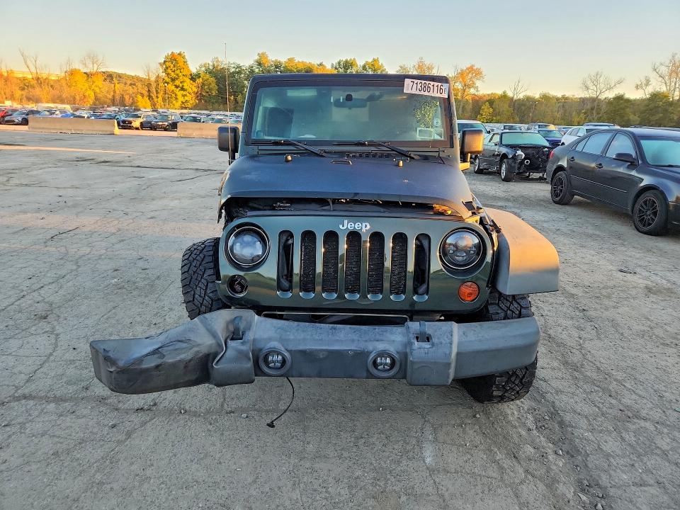 Photo 5 from auction – 2010 JEEP WRANGLER with VIN 1J4GA2D12AL216856