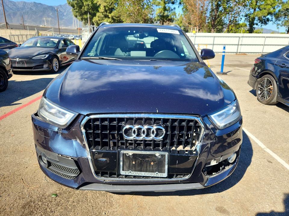 Снимка 5 от търг – 2015 AUDI Q3 с VIN WA1GFCFSXFR006524