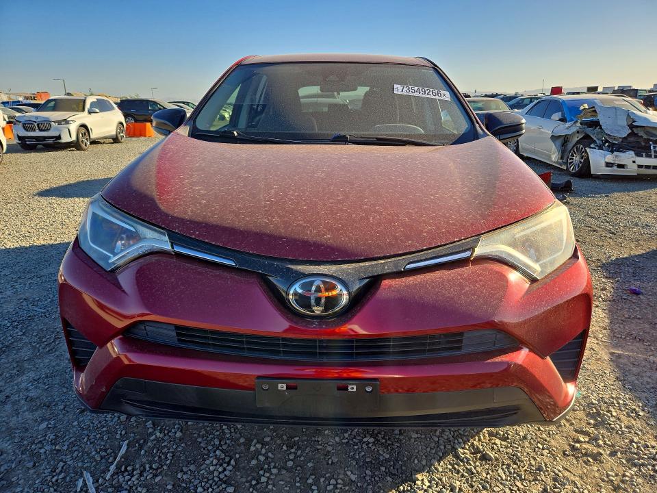 Photo 5 from auction – 2018 TOYOTA RAV4 with VIN JTMZFREVXJD120008
