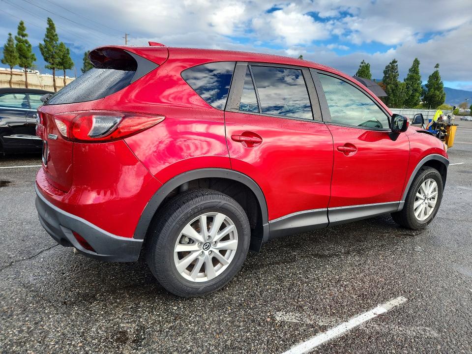 Photo 3 from auction – 2015 MAZDA CX-5 with VIN JM3KE2CY2F0547701