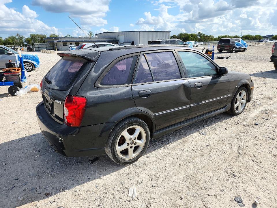 Снимка 3 от търг – 2002 MAZDA PROTEGE с VIN JM1BJ245221478148