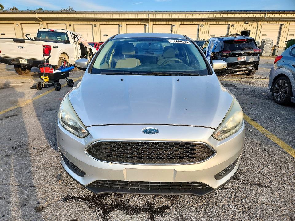 Foto 5 de la subasta – 2015 FORD FOCUS con VIN 1FADP3F24FL292076