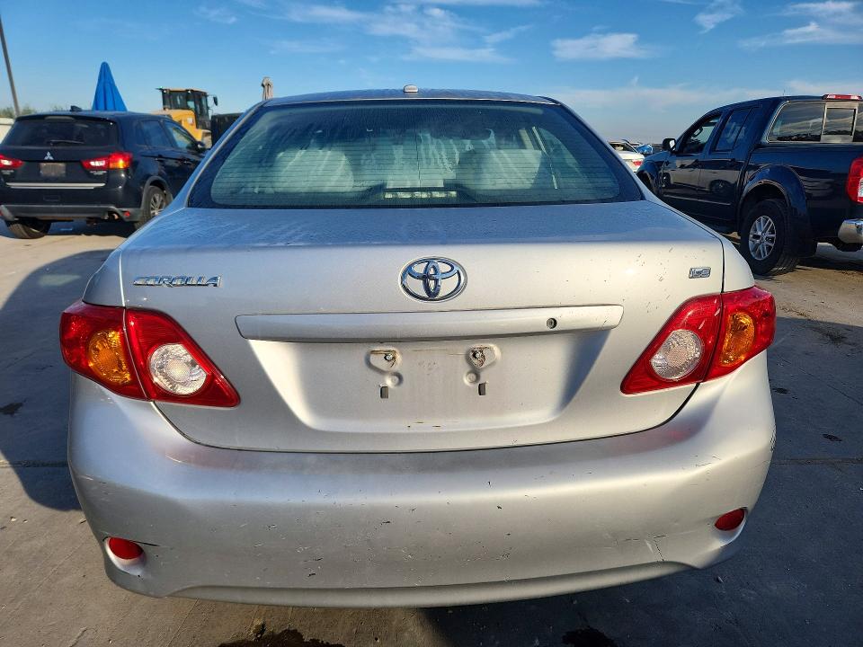 Снимка 6 от търг – 2009 TOYOTA COROLLA с VIN 1NXBU40E59Z009567