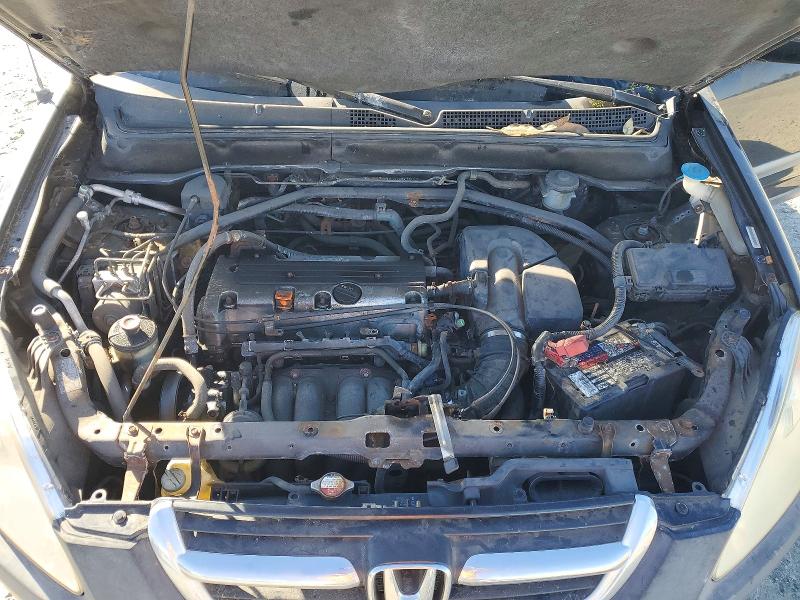 Photo 12 from auction – 2004 HONDA CR-V with VIN JHLRD78844C057677