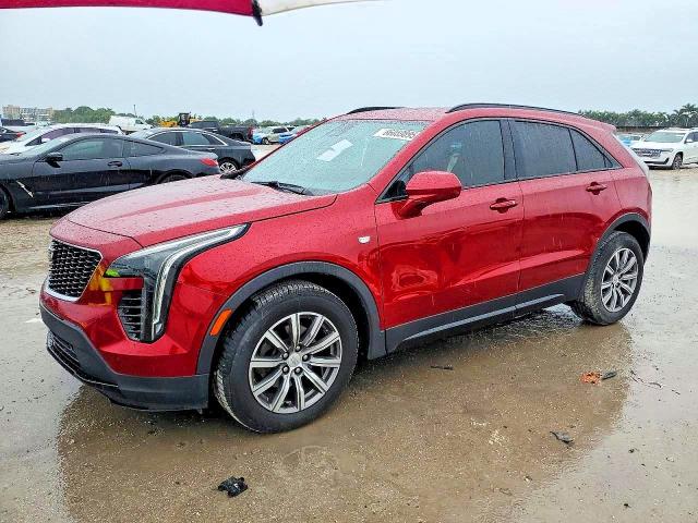 CADILLAC XT4 2019 with VIN 1GYFZER40KF199063 - Photo from auction