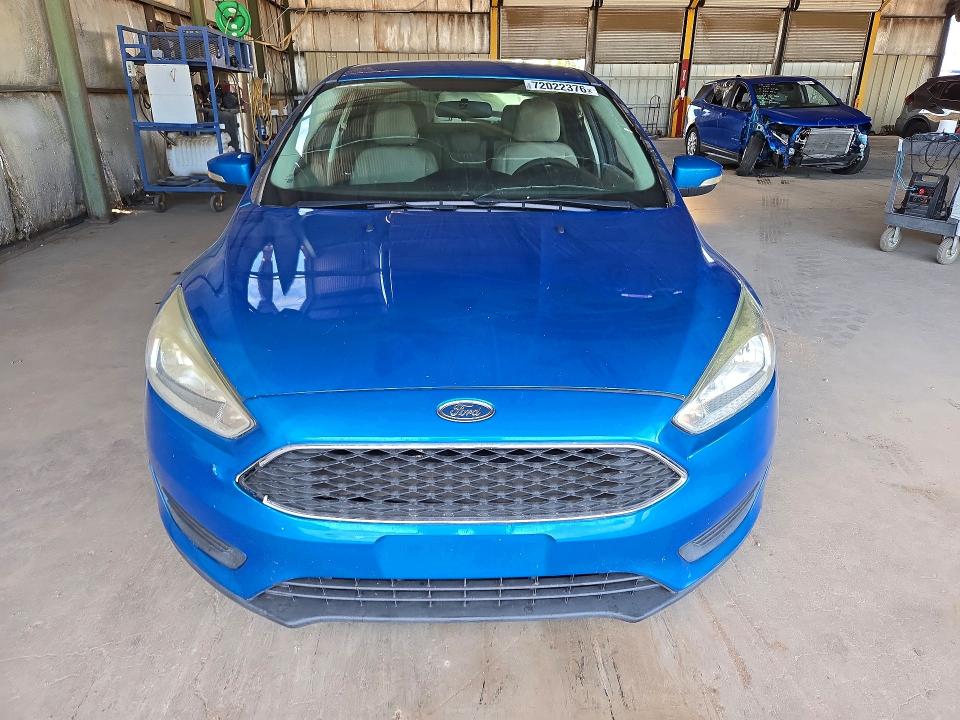 Photo 5 from auction – 2016 FORD FOCUS with VIN 1FADP3F21GL395893