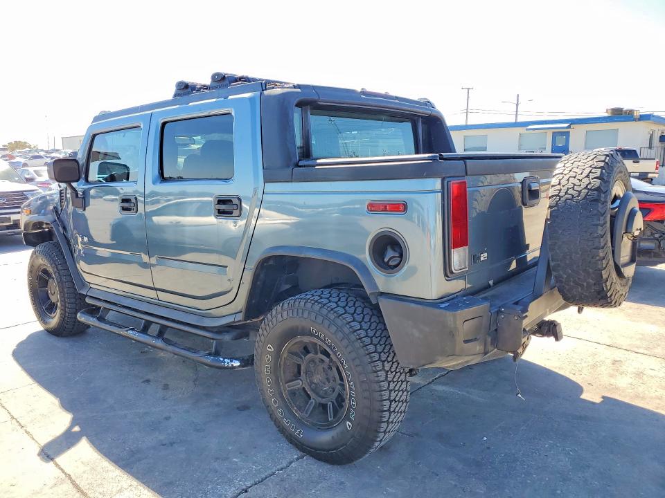 Photo 2 from auction – 2005 HUMMER H2 SUT with VIN 5GRGN22U15H112244