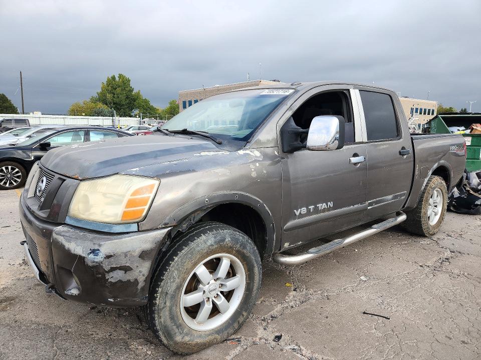 NISSAN TITAN 2011 with VIN 1N6AA0ECXBN317596 - Photo from auction