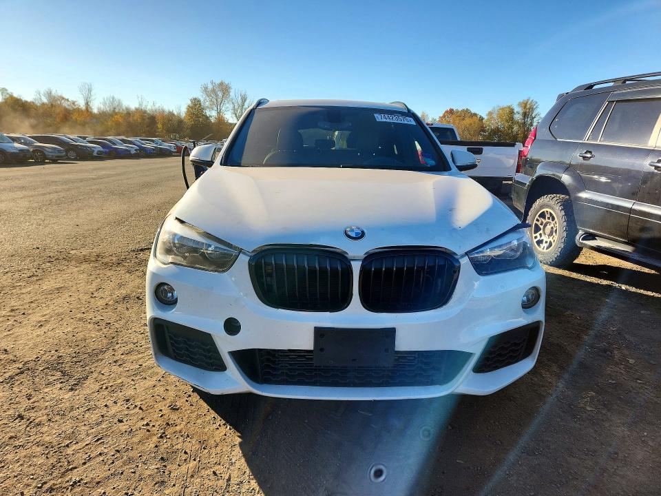 Снимка 5 от търг – 2018 BMW X1 с VIN WBXHT3C34J5F89629