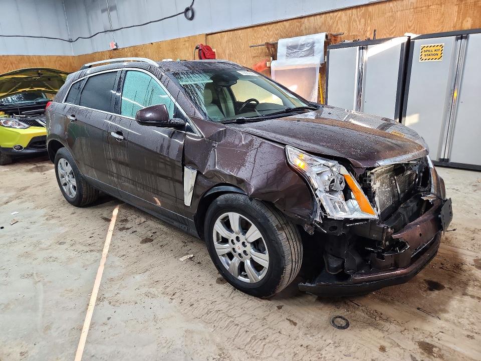 Снимка 4 от търг – 2015 CADILLAC SRX с VIN 3GYFNEE30FS528564