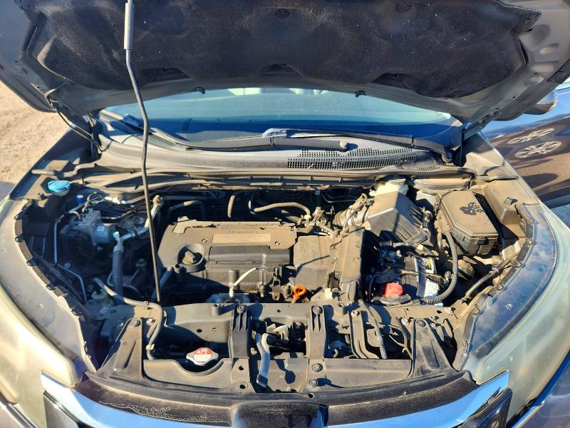 Photo 12 from auction – 2015 HONDA CR-V with VIN 2HKRM3H33FH536447