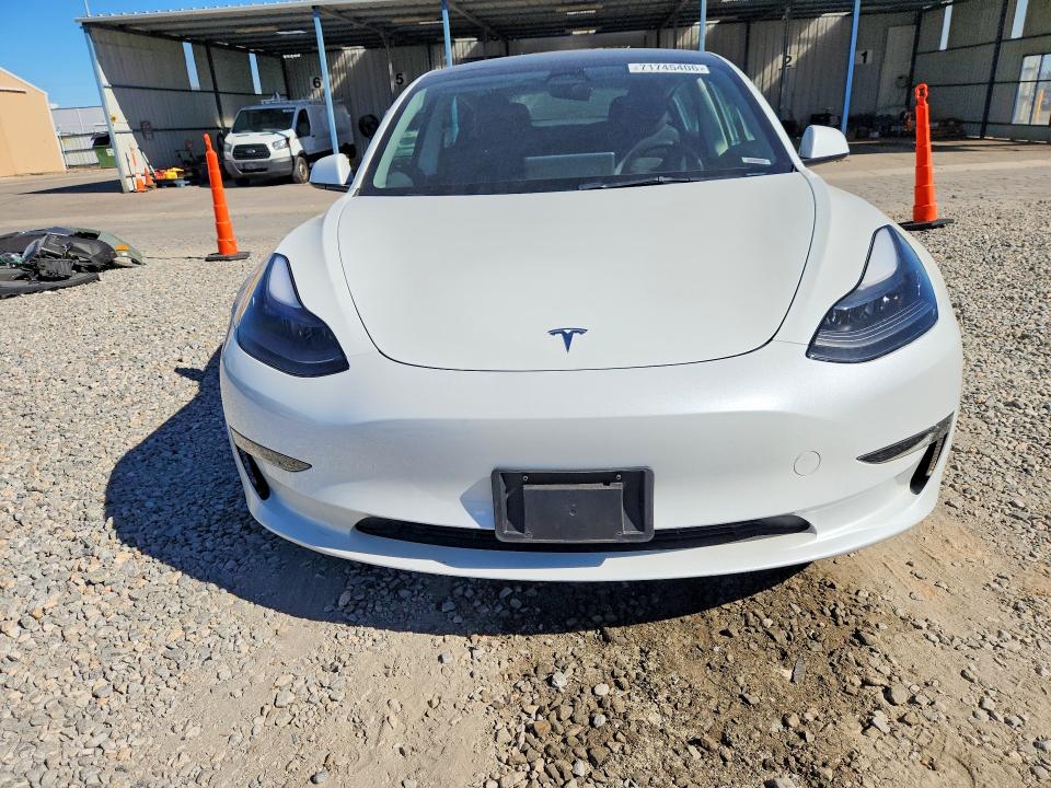 Photo 5 from auction – 2023 TESLA MODEL 3 with VIN 5YJ3E1EB8PF390761