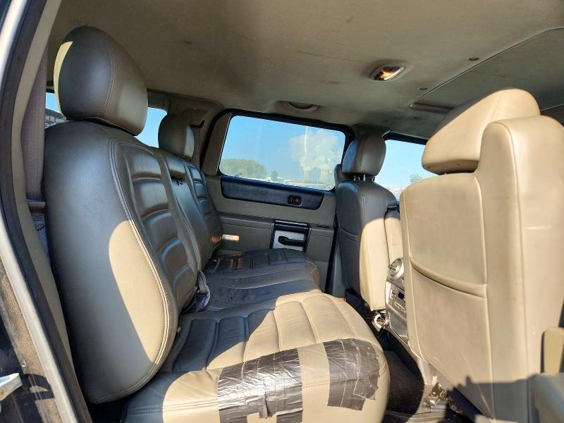 Фото 11 с аукциона – 2003 HUMMER H2 с VIN 5GRGN23U33H129056
