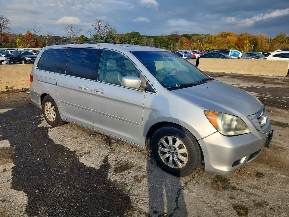 Снимка 4 от търг – 2010 HONDA ODYSSEY с VIN 5FNRL3H65AB056365