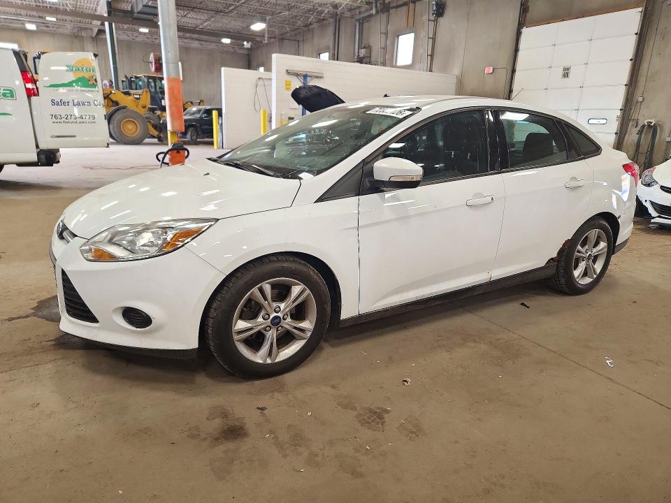 FORD FOCUS 2014 with VIN 1FADP3F29EL299989 - Photo from auction