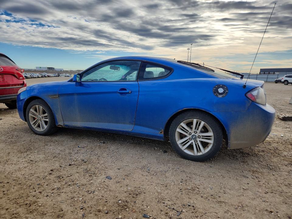 Photo 2 from auction – 2007 HYUNDAI TIBURON with VIN KMHHM65D17U260816