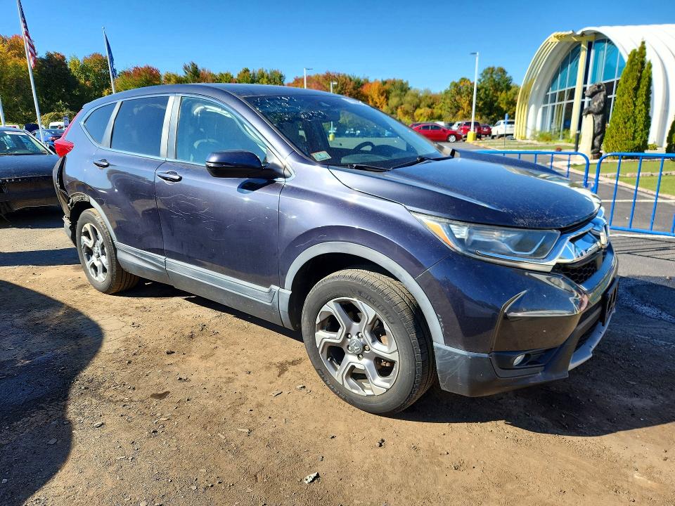 Photo 4 from auction – 2017 HONDA CR-V with VIN 5J6RW2H81HL021665