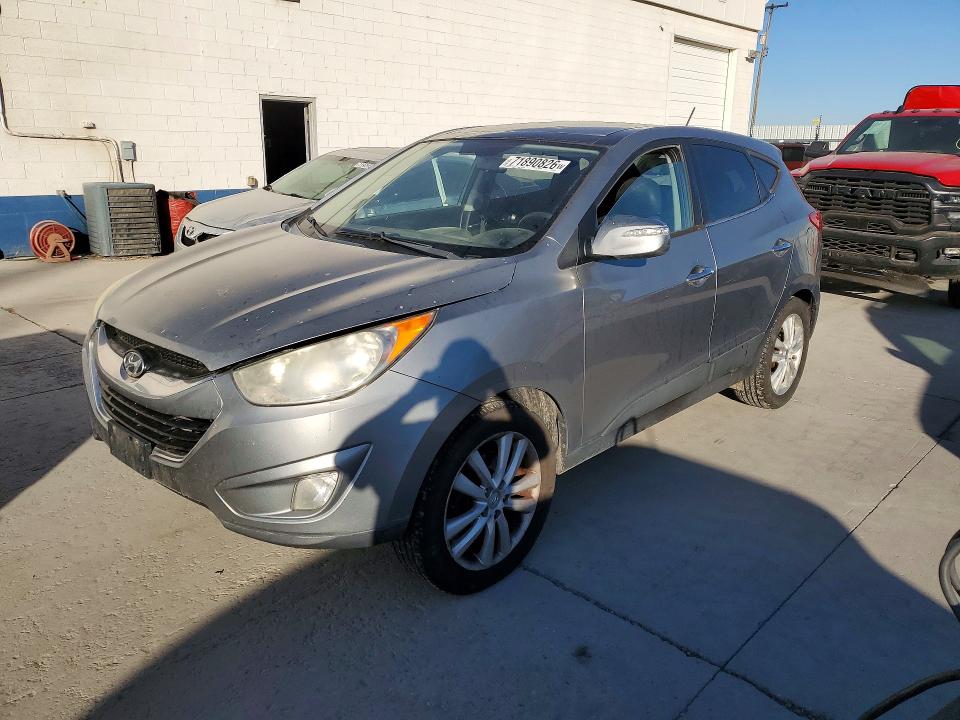Снимка 1 от търг – 2010 HYUNDAI TUCSON с VIN KM8JUCAC1AU034084