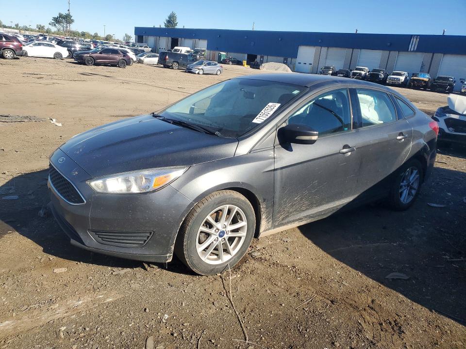 FORD FOCUS 2016 with VIN 1FADP3F22GL394574 - Photo from auction