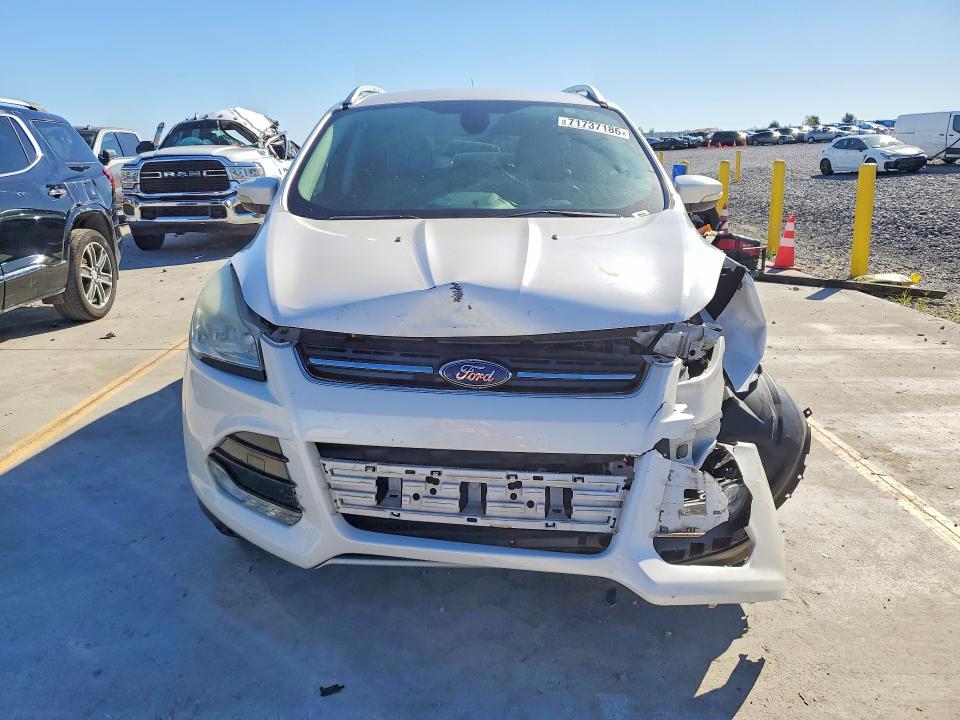 Foto 5 de la subasta – 2014 FORD ESCAPE con VIN 1FMCU9JX2EUB41097