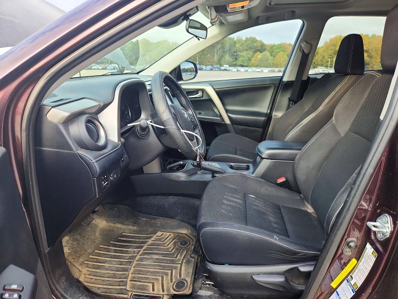 Снимка 7 от търг – 2018 TOYOTA RAV4 с VIN 2T3RFREV0JW696502