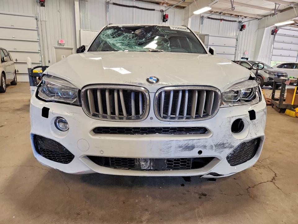 Foto 5 de la subasta – 2015 BMW X5 con VIN 5UXKR6C53F0J74032