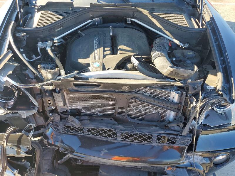 Снимка 12 от търг – 2013 BMW X5 с VIN 5UXZV4C51D0B05094