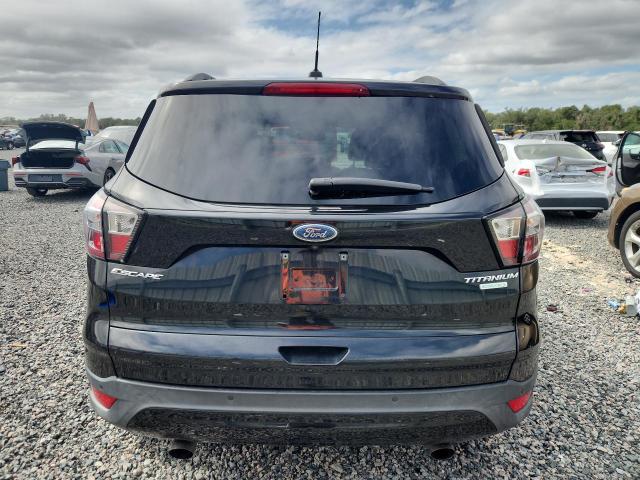 Photo 6 from auction – 2017 FORD ESCAPE with VIN 1FMCU0J97HUE92573