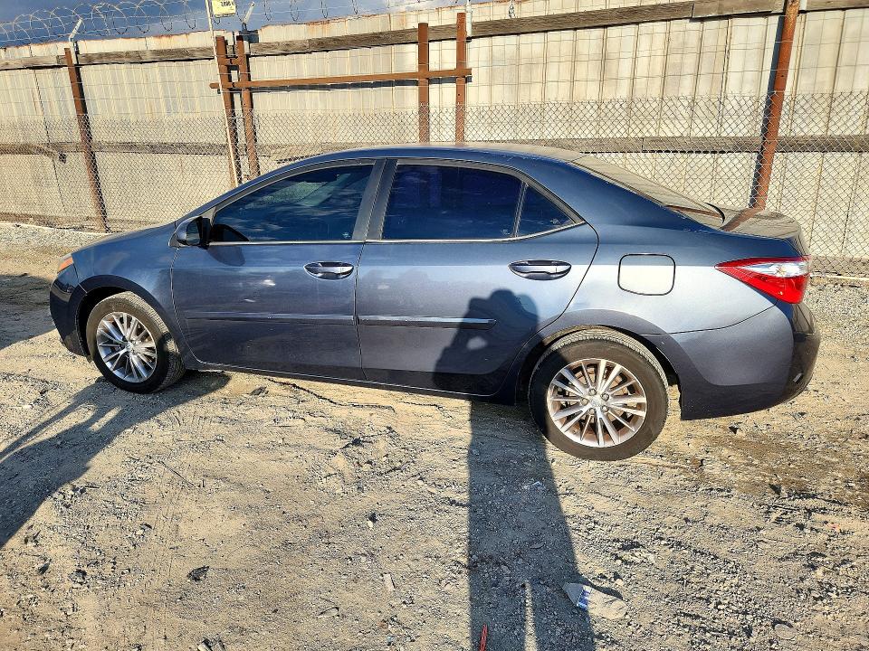 Снимка 2 от търг – 2015 TOYOTA COROLLA с VIN 5YFBURHEXFP359694