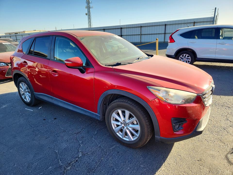 Photo 4 from auction – 2016 MAZDA CX-5 with VIN JM3KE2CY6G0812220