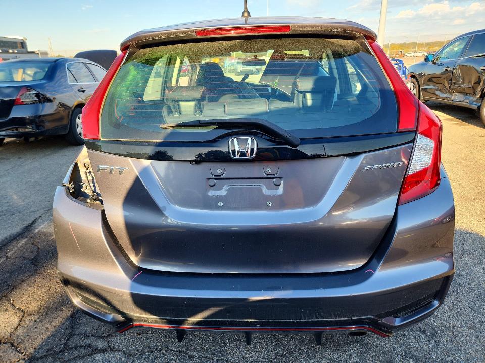 Снимка 6 от търг – 2018 HONDA FIT с VIN 3HGGK5H67JM716294