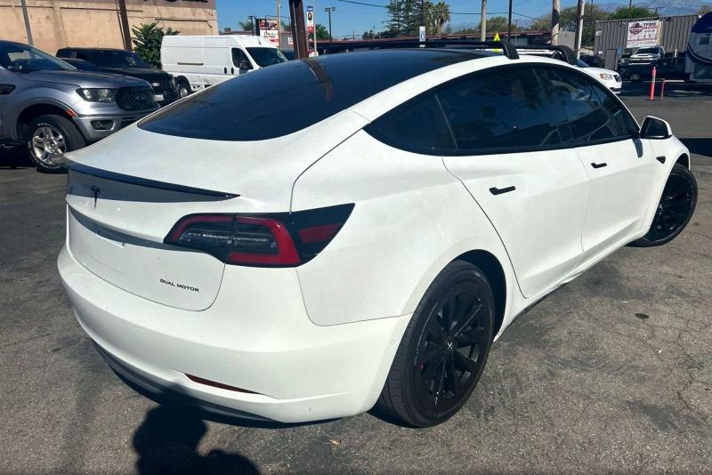 Снимка 4 от търг – 2022 TESLA MODEL 3 с VIN 5YJ3E1EB3NF144830