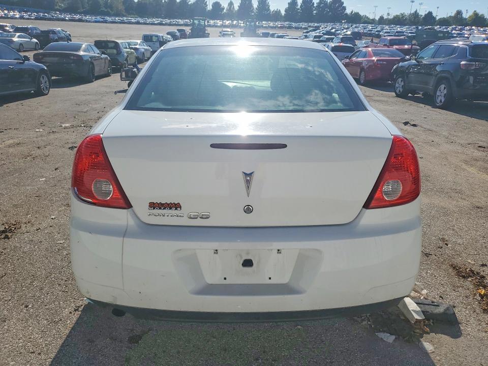 Снимка 6 от търг – 2009 PONTIAC G6 с VIN 1G2ZJ57B494273817