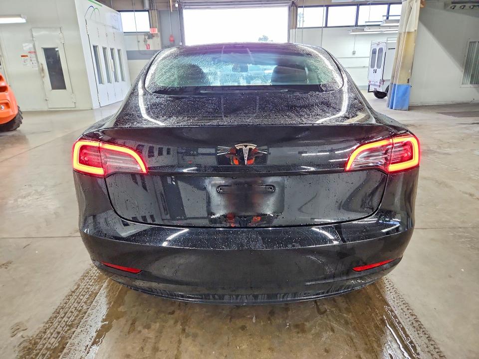 Снимка 6 от търг – 2023 TESLA MODEL 3 с VIN 5YJ3E1EA1PF438902
