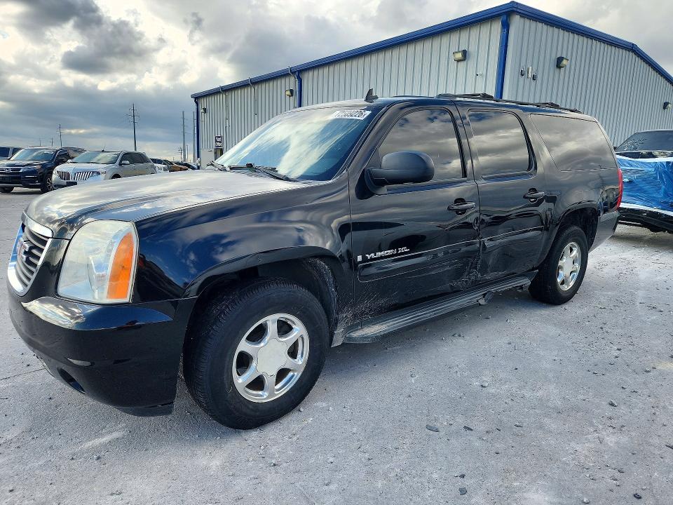 GMC YUKON XL 2009 с VIN 1GKFC36069R199675 - Снимка от търг