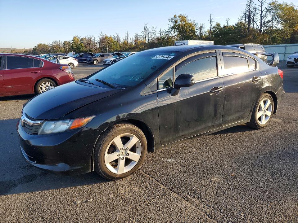HONDA CIVIC 2012 with VIN 2HGFB2F57CH560196 - Photo from auction