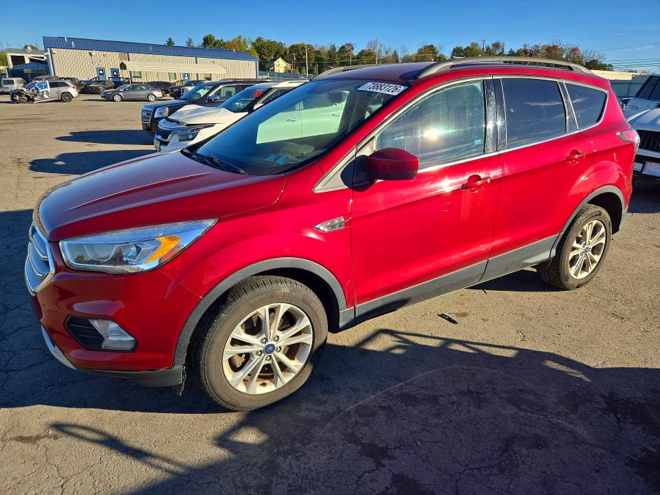 FORD ESCAPE 2017 with VIN 1FMCU9G9XHUB35111 - Photo from auction