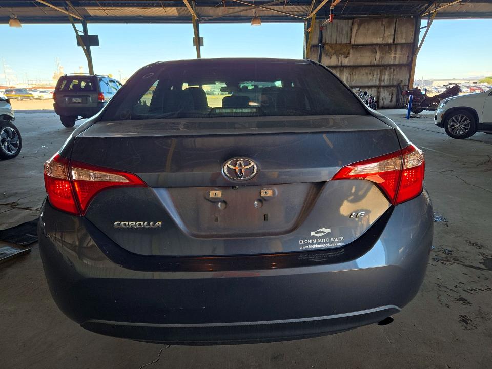 Снимка 6 от търг – 2017 TOYOTA COROLLA с VIN 5YFBURHE0HP734608