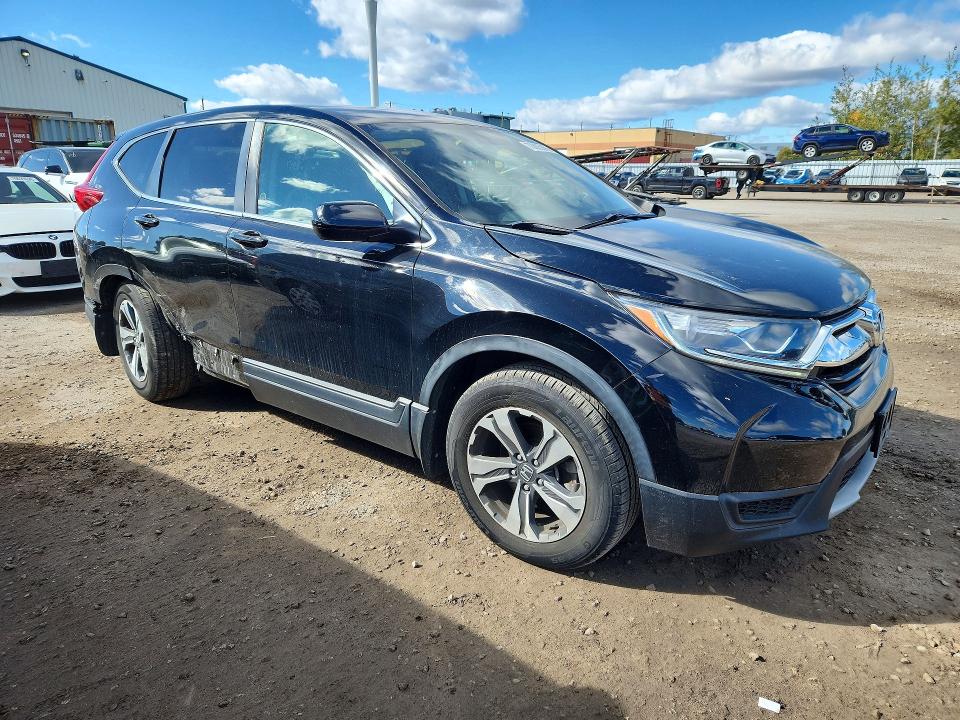 Снимка 4 от търг – 2018 HONDA CR-V с VIN 2HKRW1H31JH001480