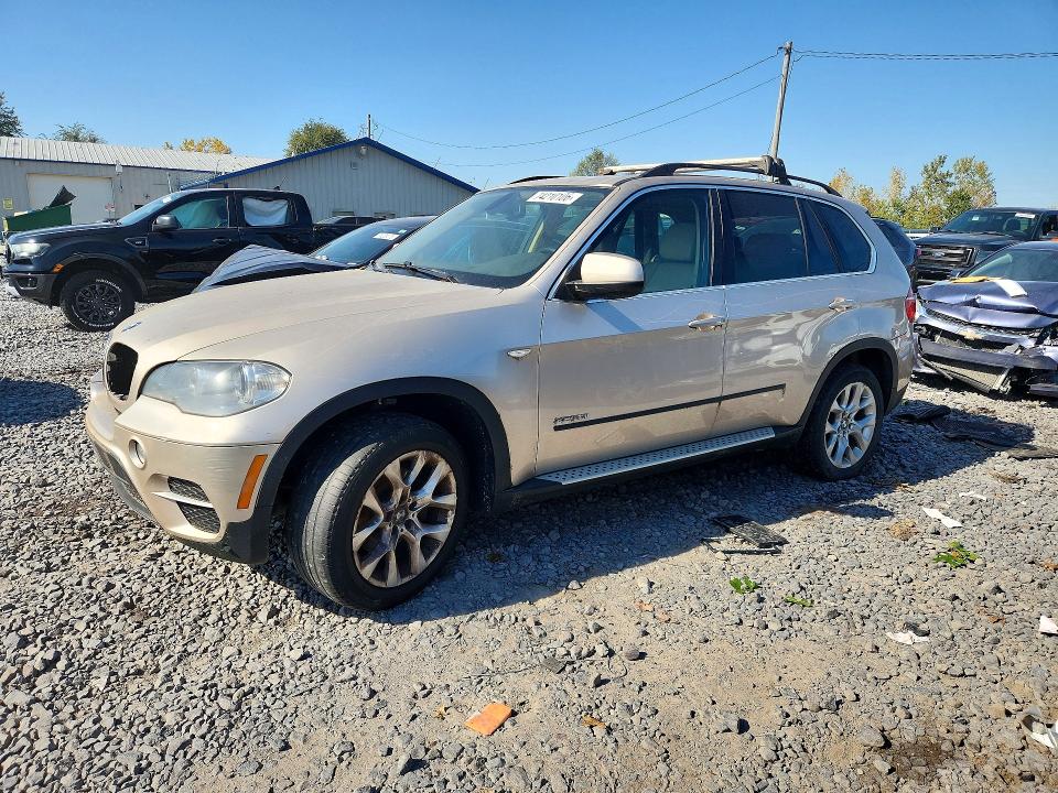 BMW X5 2013 с VIN 5UXZV4C55D0B01159 - Снимка от търг